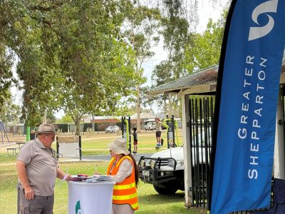 Community members visiting a pop-up information stall