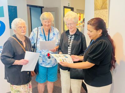 Community members attending an information session